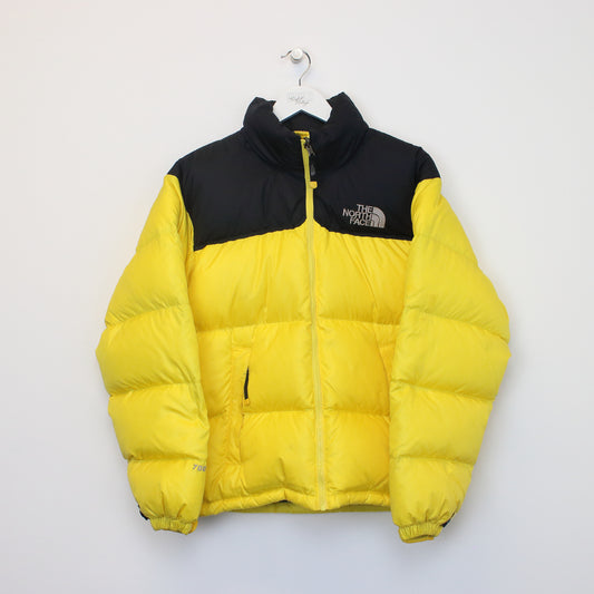The North Face 700 nuptse series puffer jacket in yellow. Best fits S