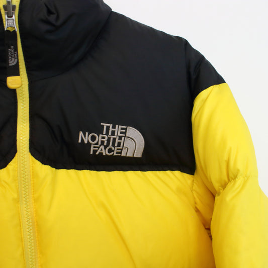 The North Face 700 nuptse series puffer jacket in yellow. Best fits S