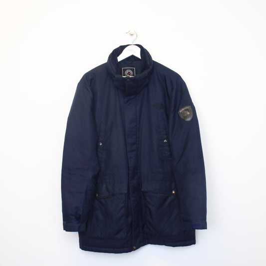 The North Face McMurdo series puffer jacket in navy. Best fits XL