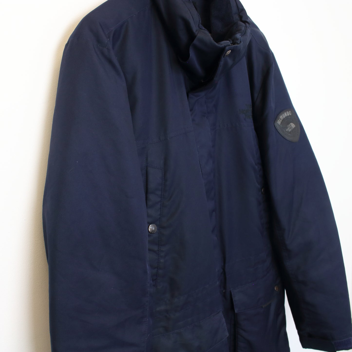 The North Face McMurdo series puffer jacket in navy. Best fits XL