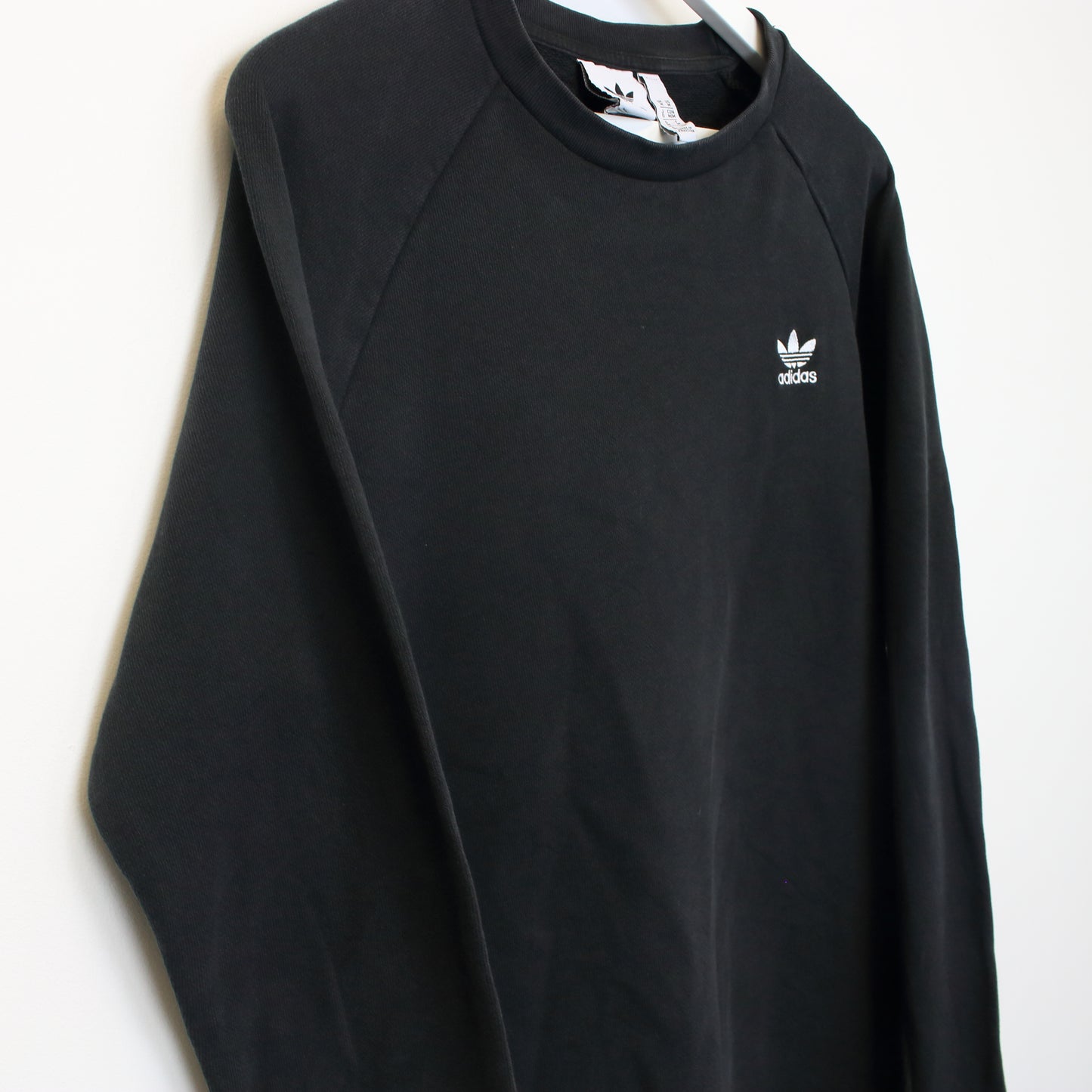 Vintage Adidas sweatshirt in black. Best fits L