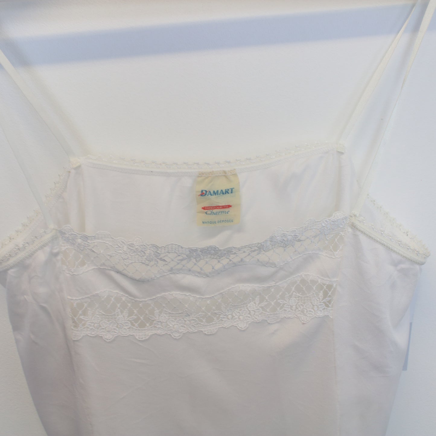 Vintage women's Dmart cami in white. Best fits M