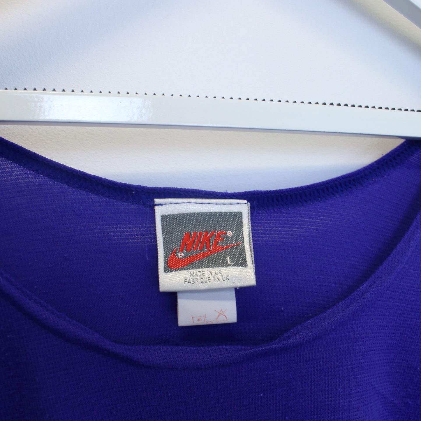 Vintage Women's Nike tank top in purple and pink. Best fits L