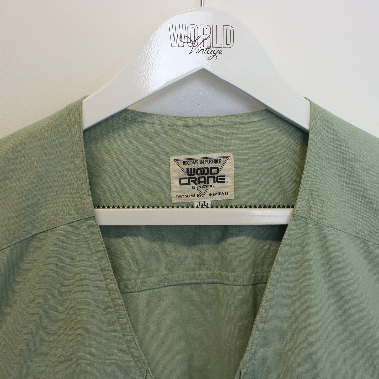 Vintage Wood Crane vest in green. Best fits L