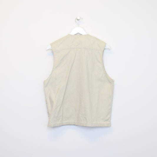 Vintage Unbranded vest in beige. Best fits L