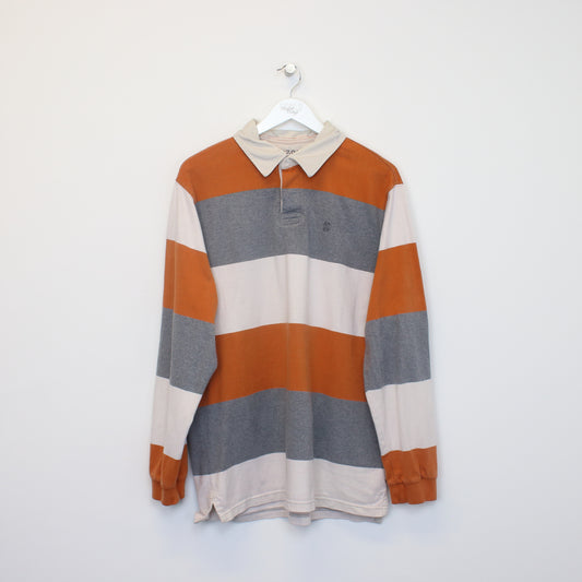 Vintage Izod rugby shirt in orange, grey, and white. Best fits L