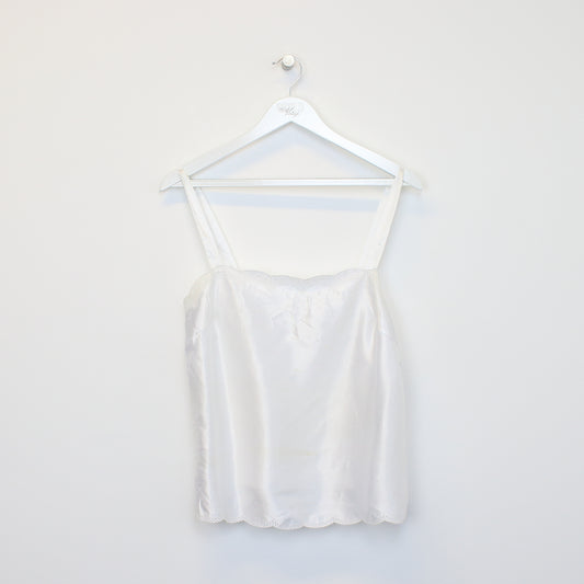 Vintage women's Unbranded cami in white. Best fits L