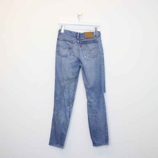 Vintage Levi's jeans in Blue. Best fits 30W