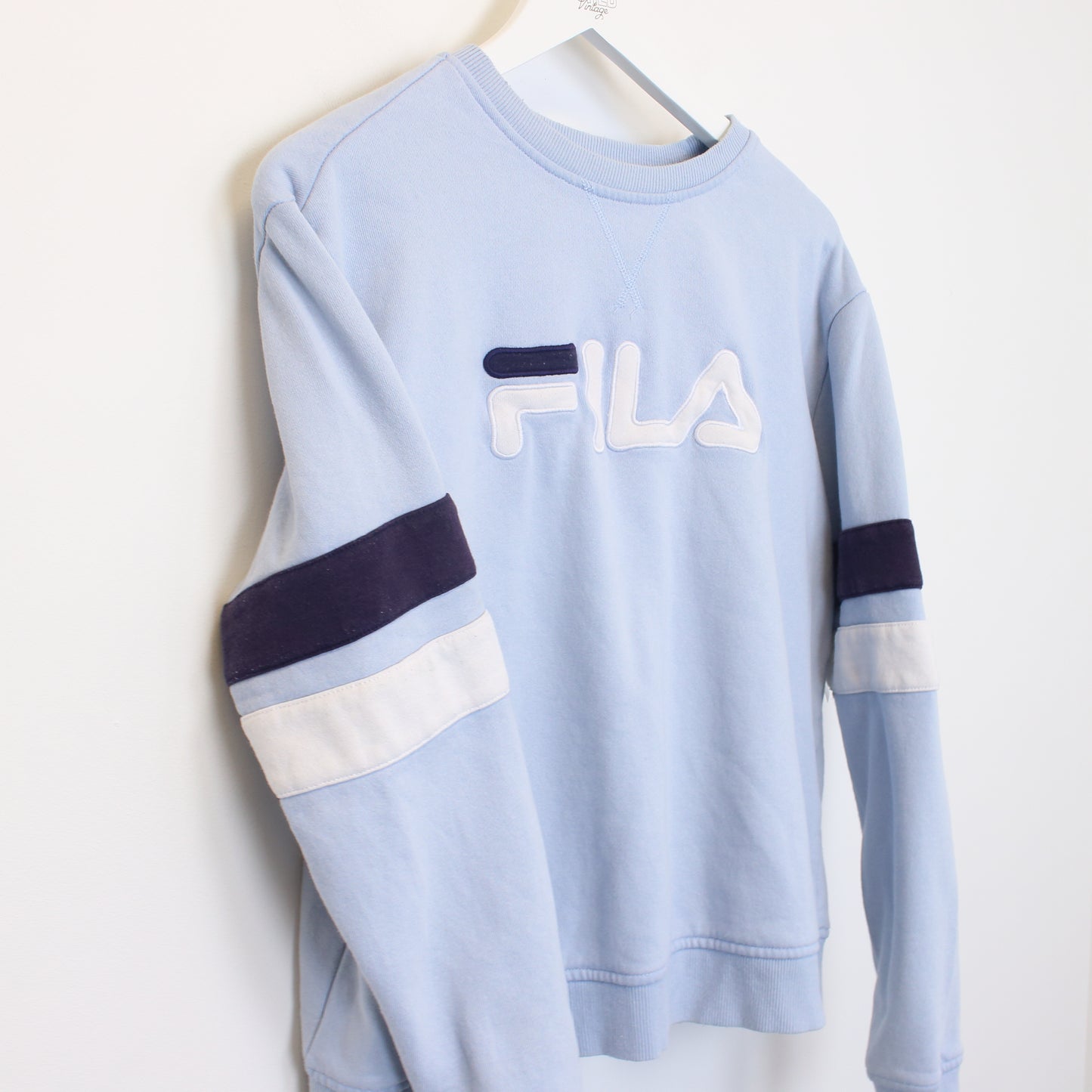 Vintage women's Fila sweatshirt in Blue. Best Fits S