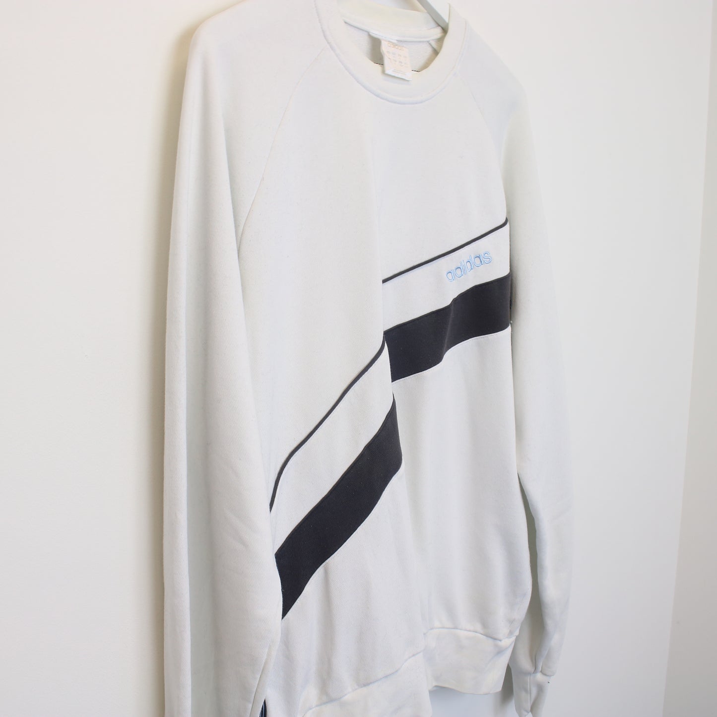 Vintage Adidas sweatshirt in White. Best Fits L