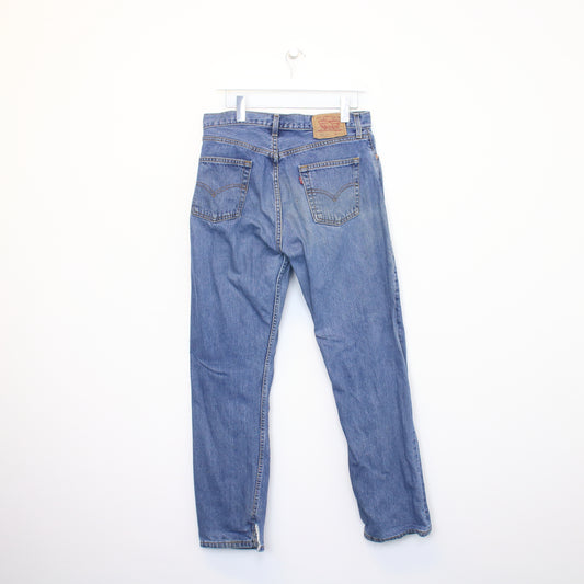 Vintage Levi's jeans in Blue. Best fits 36W