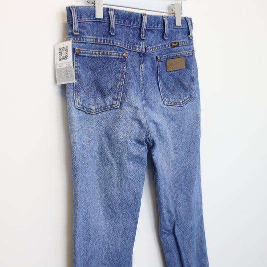Vintage Wrangler jeans in Blue. Best fits 34W