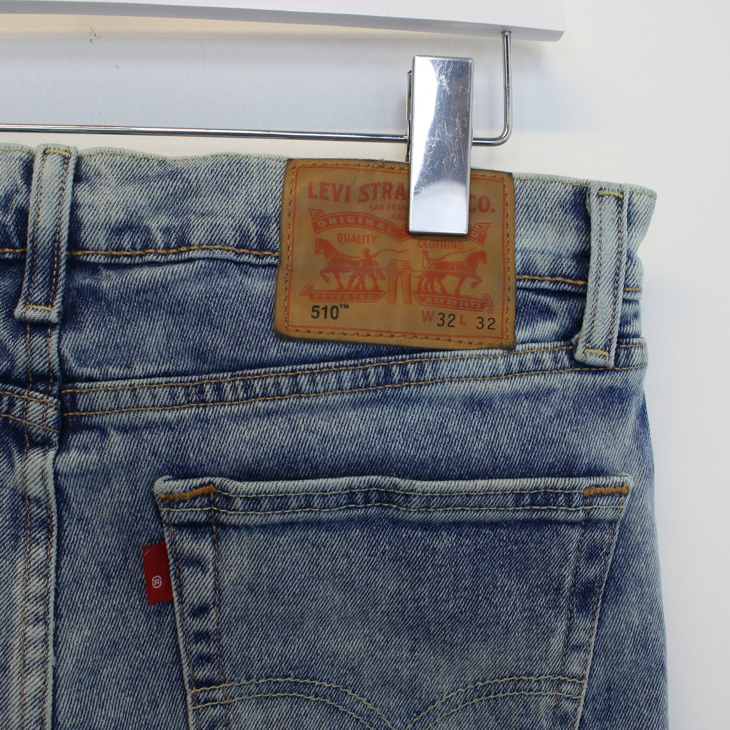 Vintage Levi's denim cut off shorts in blue. Best fits W31