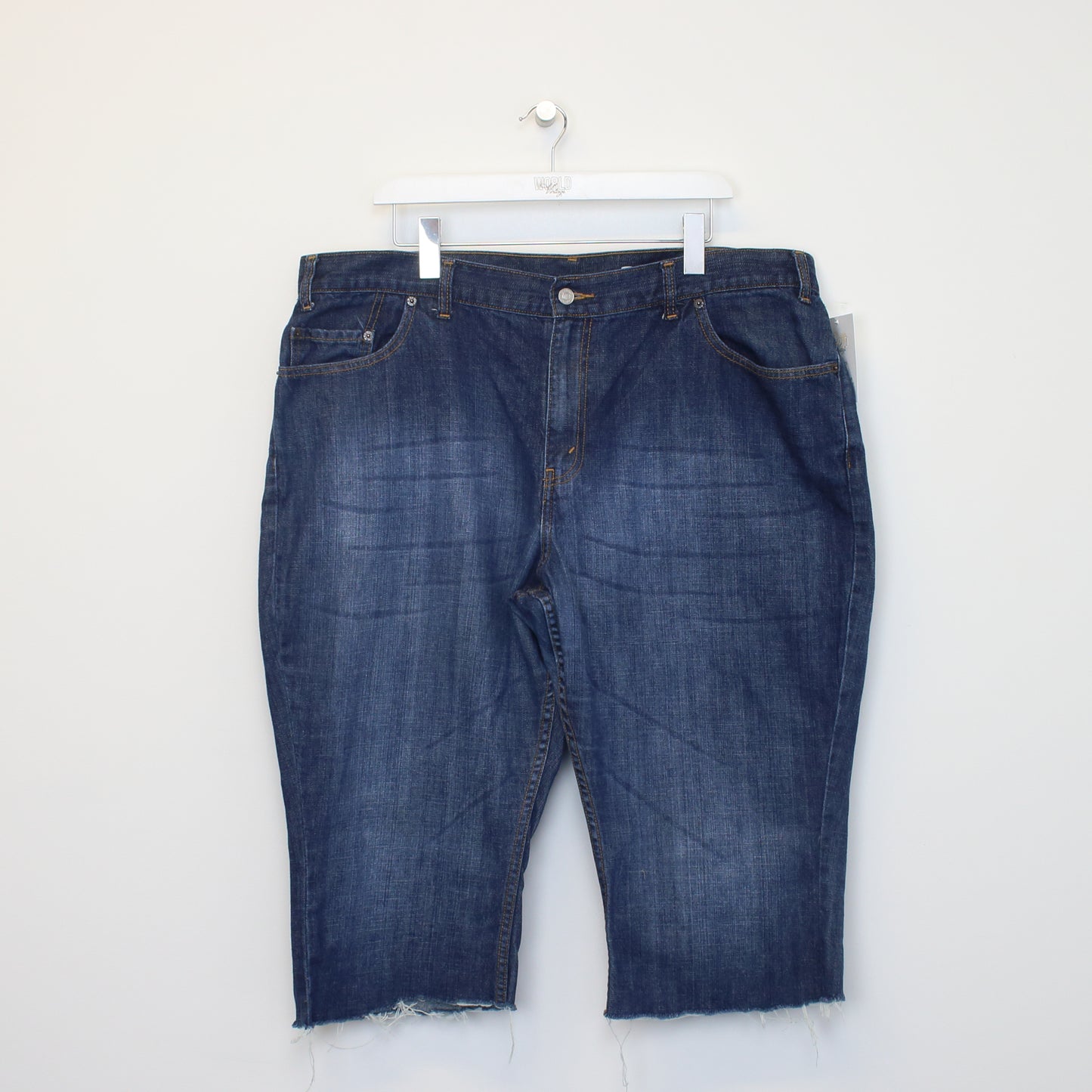 Vintage Levi's cut off denim shorts in blue. Best fits W41