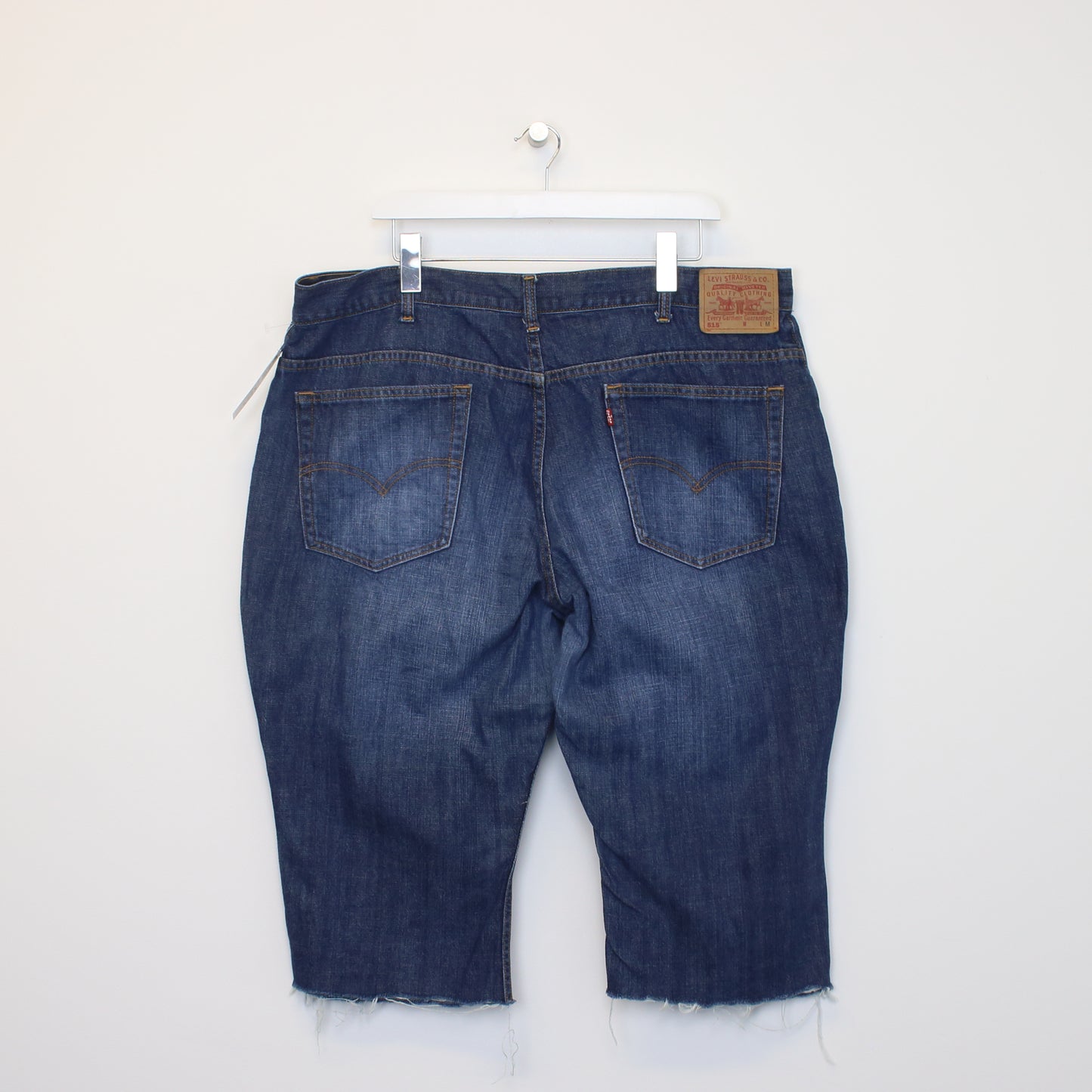 Vintage Levi's cut off denim shorts in blue. Best fits W41