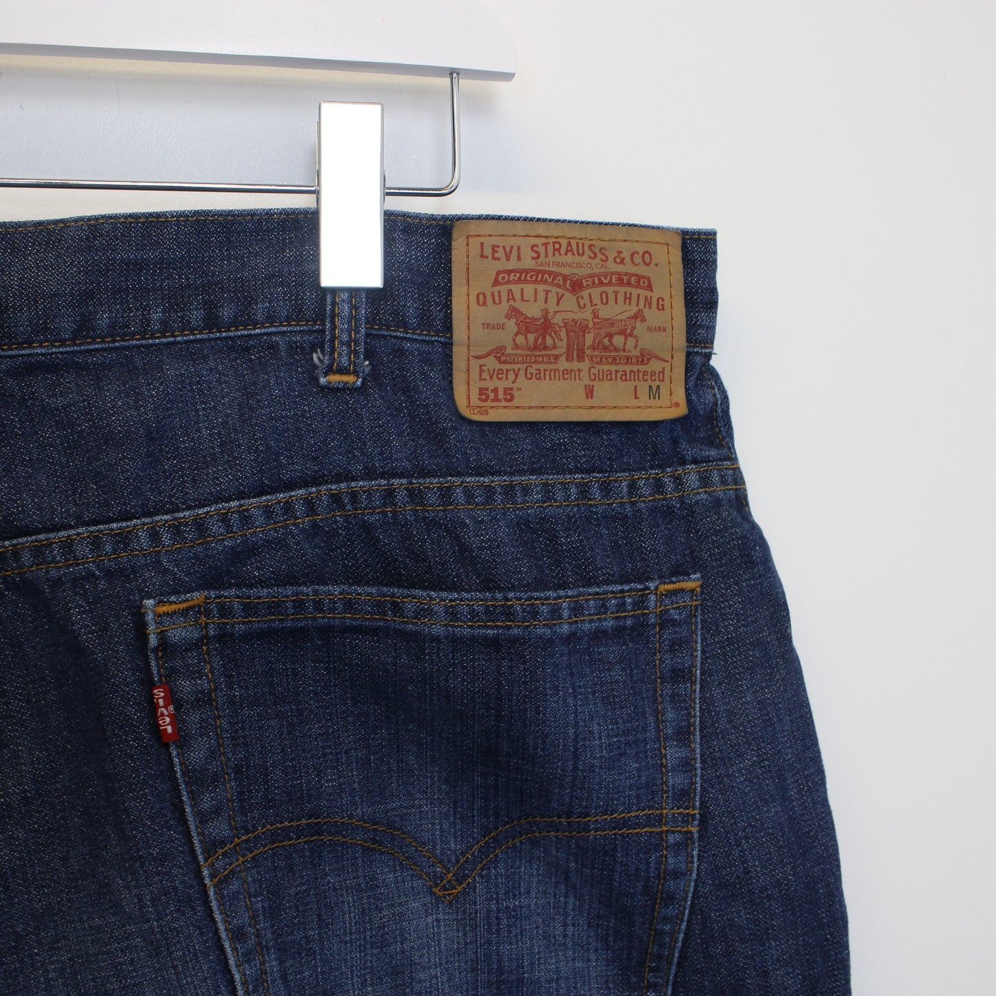 Vintage Levi's cut off denim shorts in blue. Best fits W41