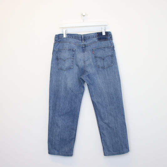 Vintage Levi's jeans in Blue. Best fits 34W