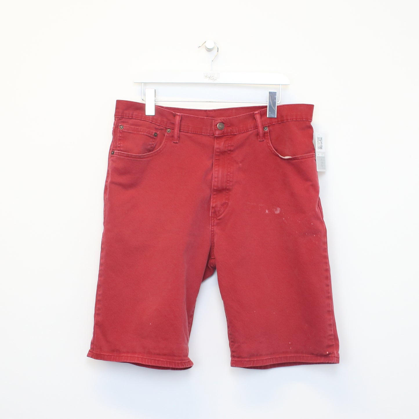 Vintage Levi's jean shorts in Red. Best fits W36