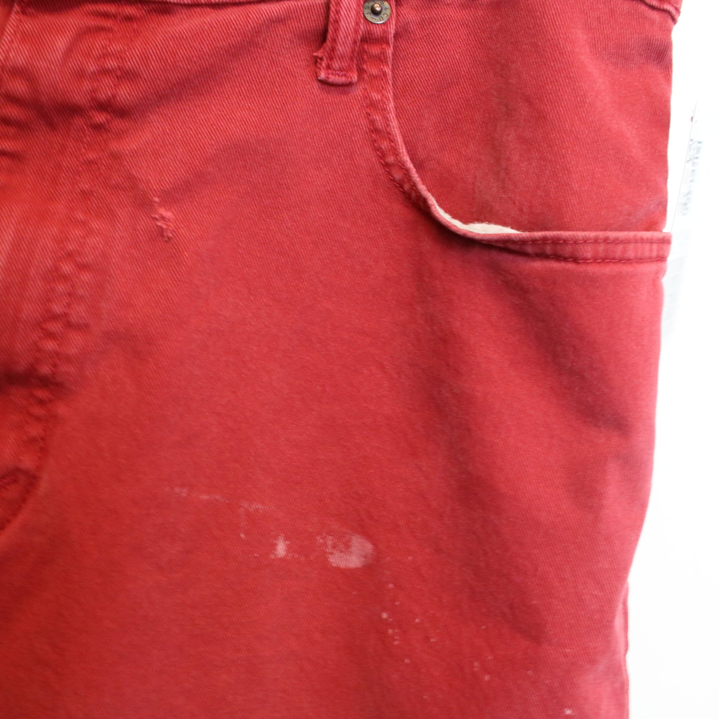 Vintage Levi's jean shorts in Red. Best fits W36