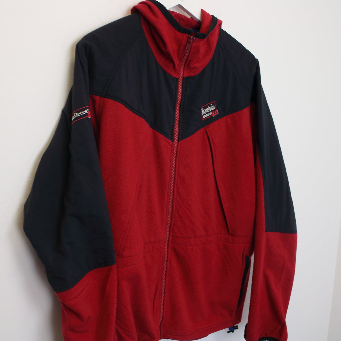 Vintage Mountain Equipment fleece in red. Best fits L