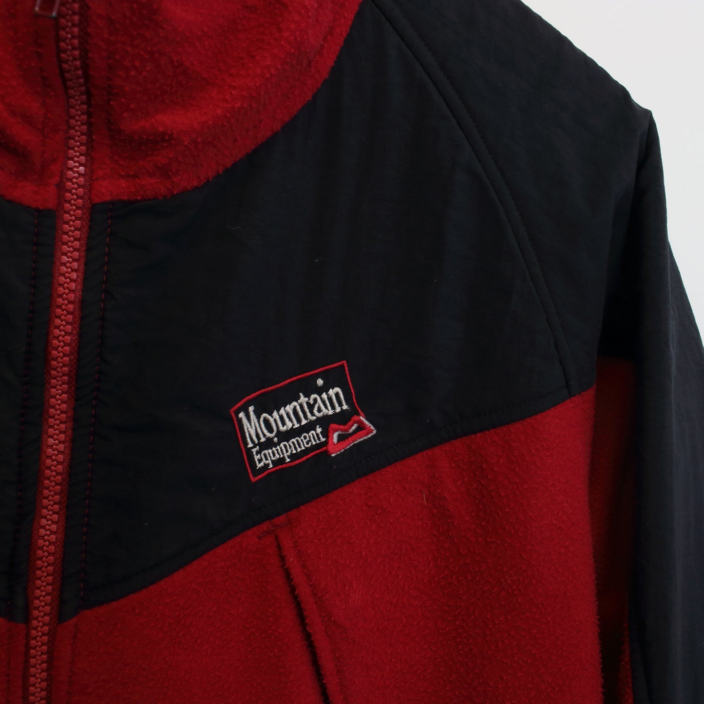 Vintage Mountain Equipment fleece in red. Best fits L