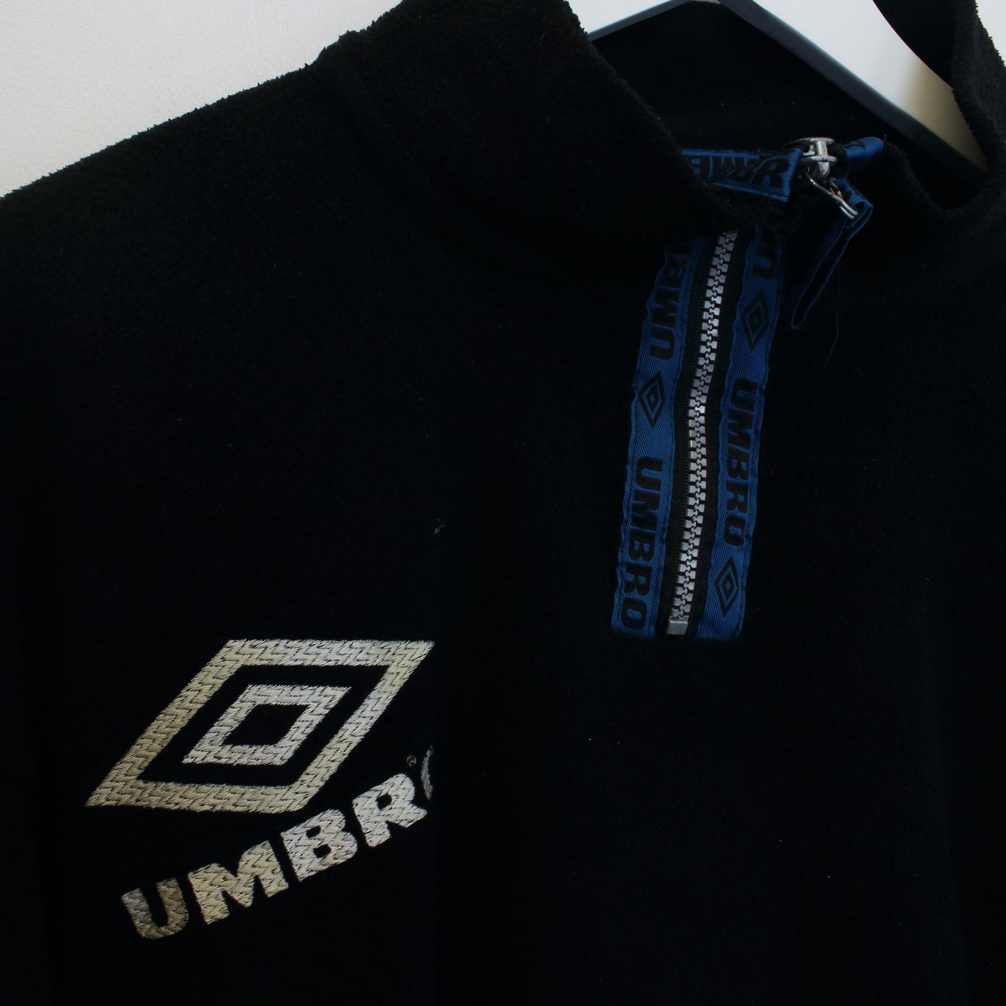 Vintage Umbro quarter zip fleece in black. Best fits L