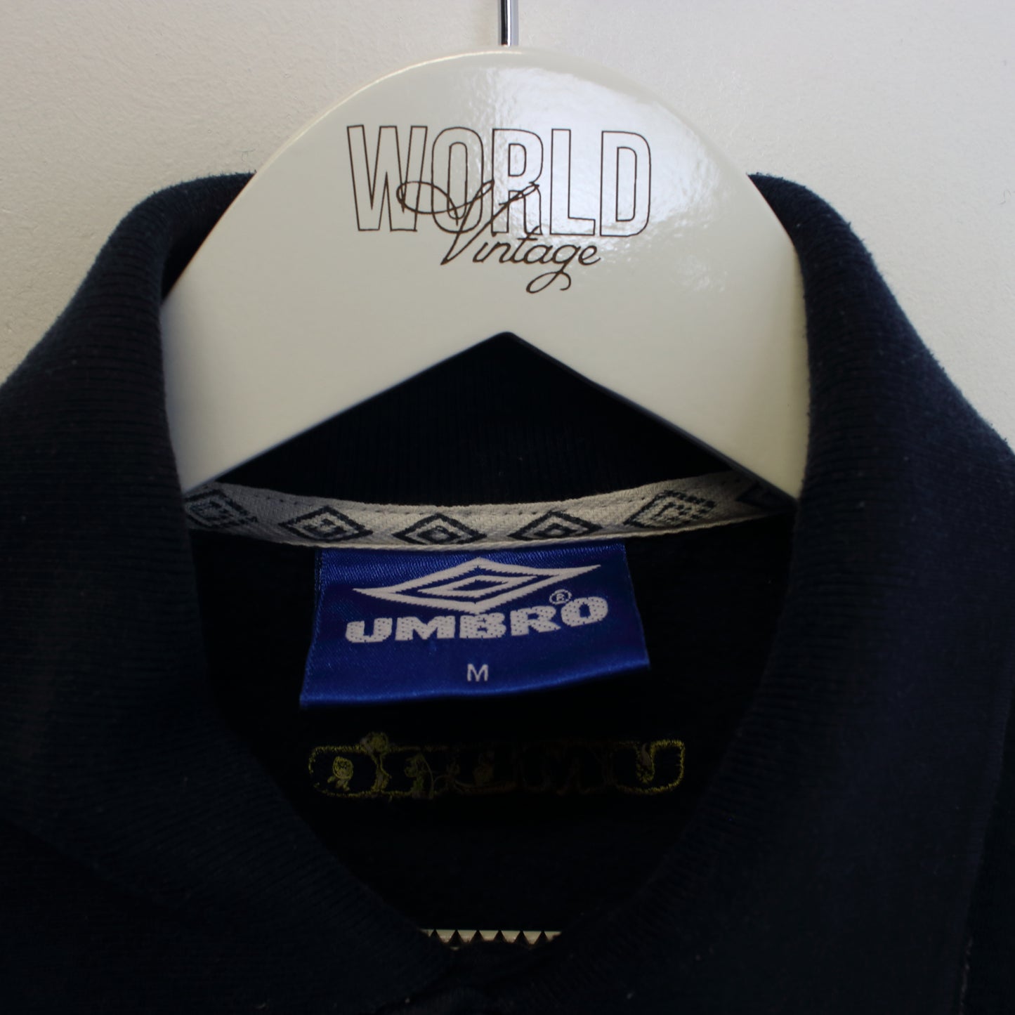 Vintage Umbro quarter button sweatshirt in navy. Best fits M