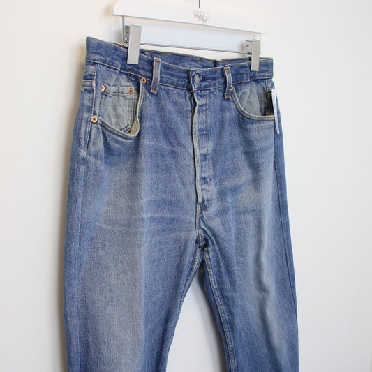 Vintage Levi's 501 jeans in blue. Best fits W38 L32