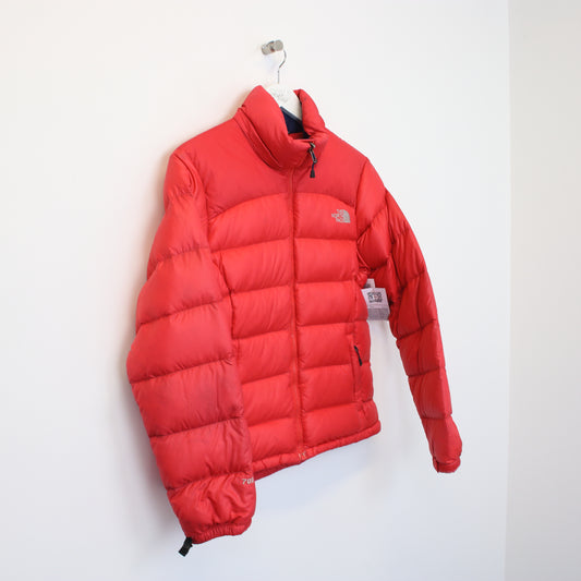 Vintage The North Face jacket in red. Best fits S