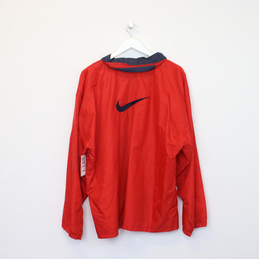 Vintage Nike jacket in red. Best fits XL