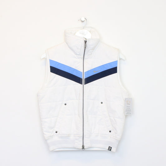 Vintage women's Nike jacket in white. Best fits M