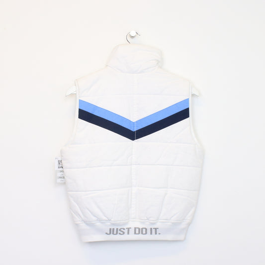 Vintage women's Nike jacket in white. Best fits M