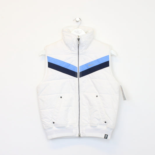 Vintage women's Nike jacket in white. Best fits M