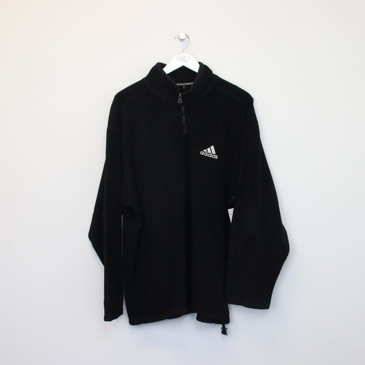 Vintage Adidas fleece in black. Best fits XL
