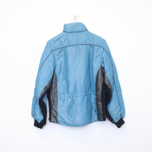 Vintage The North Face jacket in blue. Best fits M