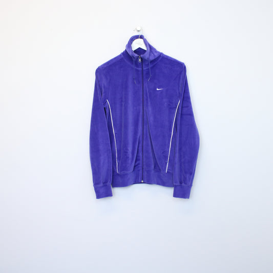 Vintage Womens Nike jacket in blue. Best fits L