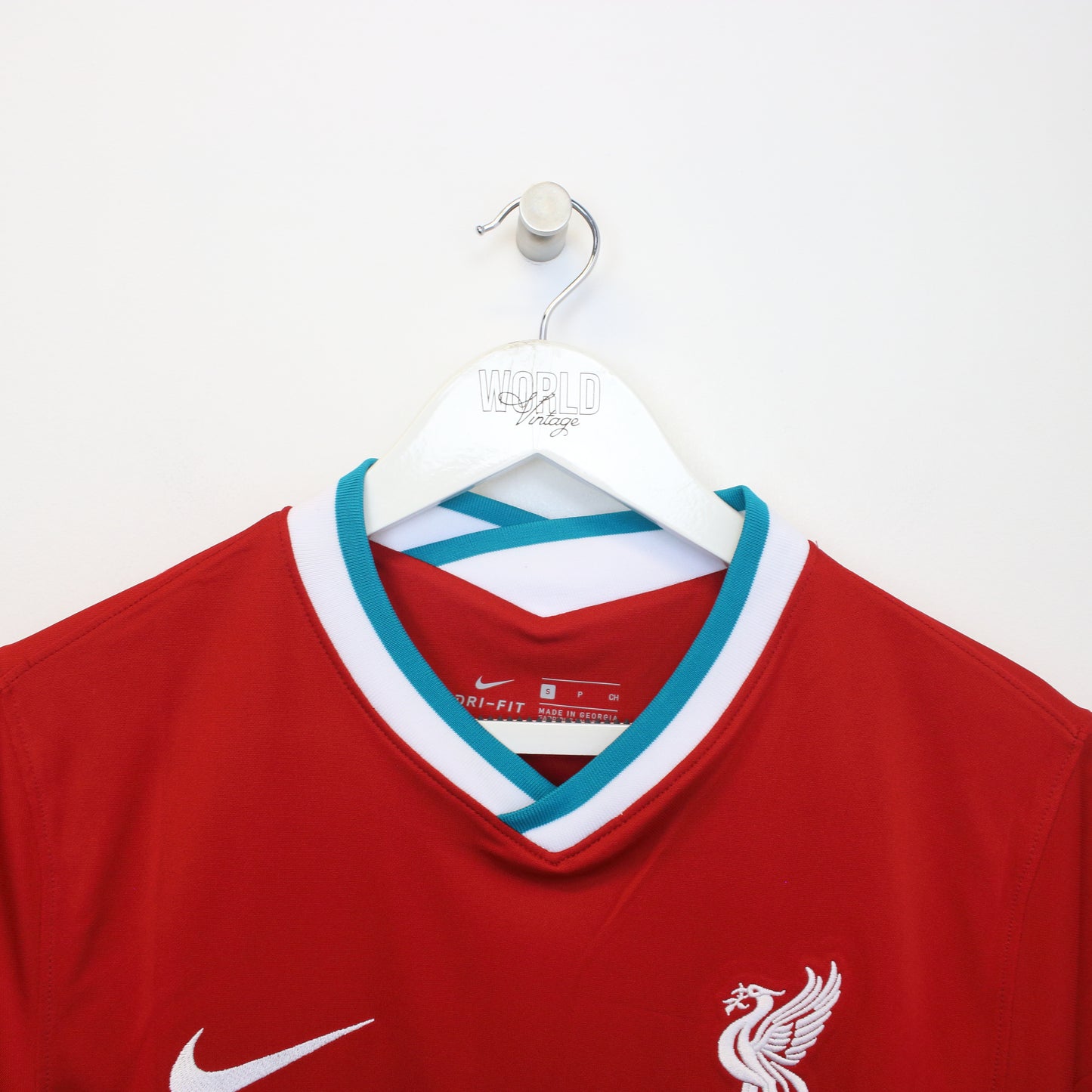 Vintage Liverpool football shirt in red. Best fits S