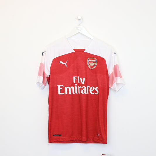 Vintage Arsenal football shirt in red. Best fits S