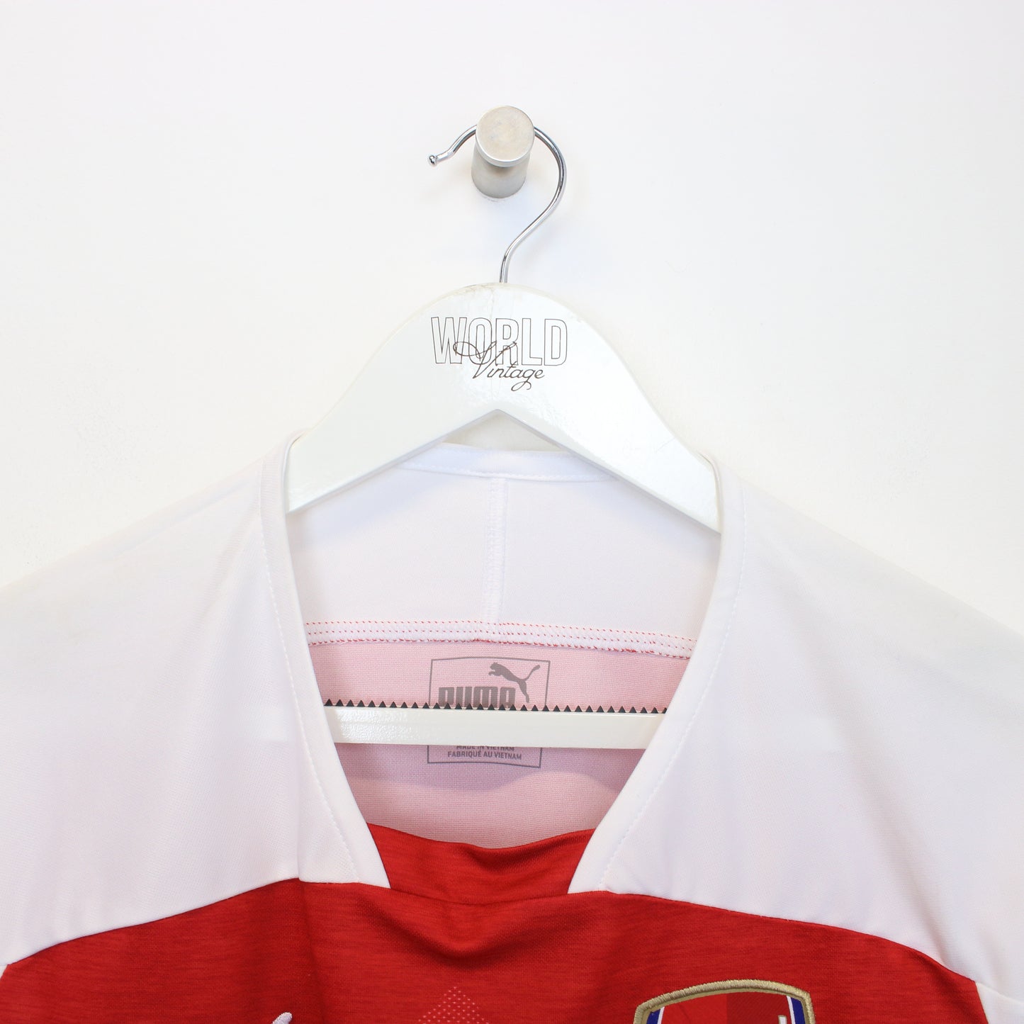 Vintage Arsenal football shirt in red. Best fits S