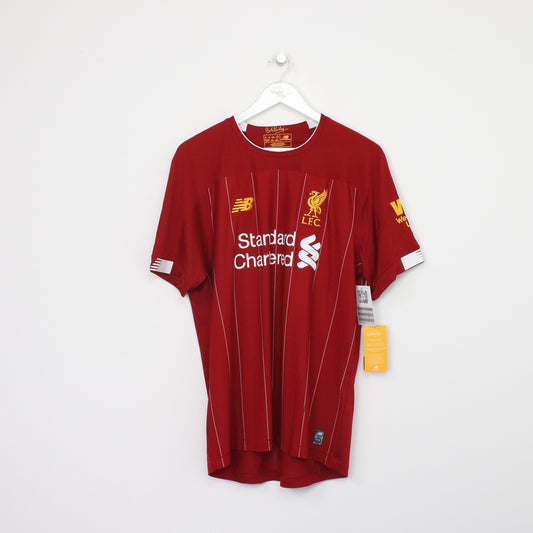 Vintage Liverpool football shirt in red. Best fits L