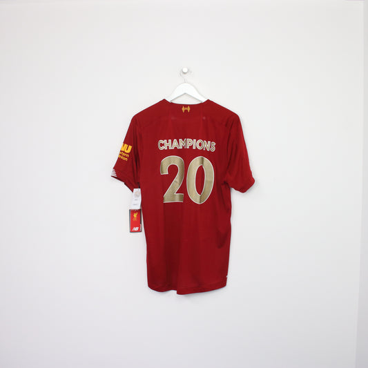 Vintage Liverpool football shirt in red. Best fits L