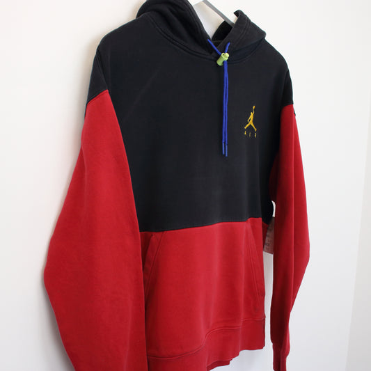 Vintage Air Jordan hoodie in black and red. Best fits L