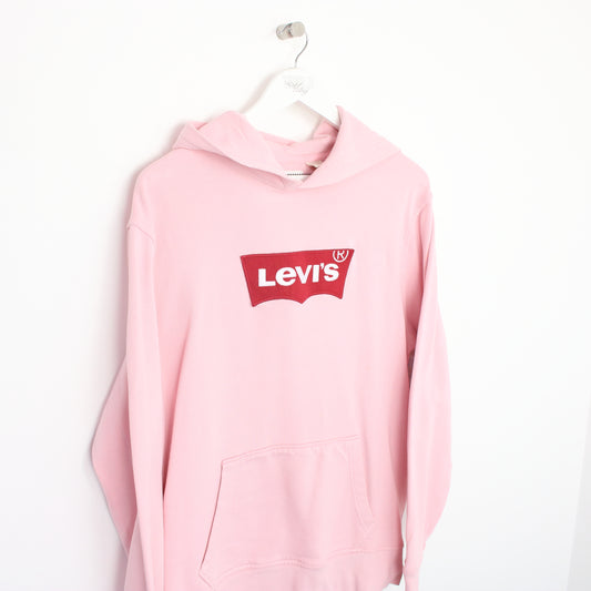 Vintage Levi's hoodie in pink. Best fits L