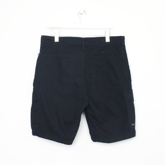 Vintage Signature Cargo shorts in black. Best fits W34