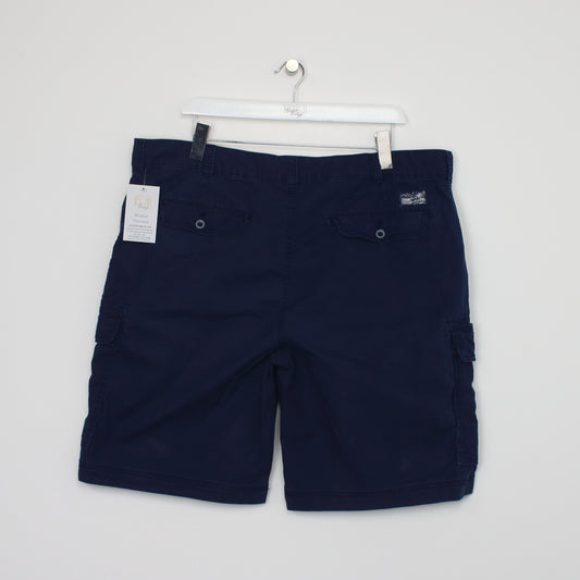 Vintage Izod Cargo shorts in navy. Best fits W40