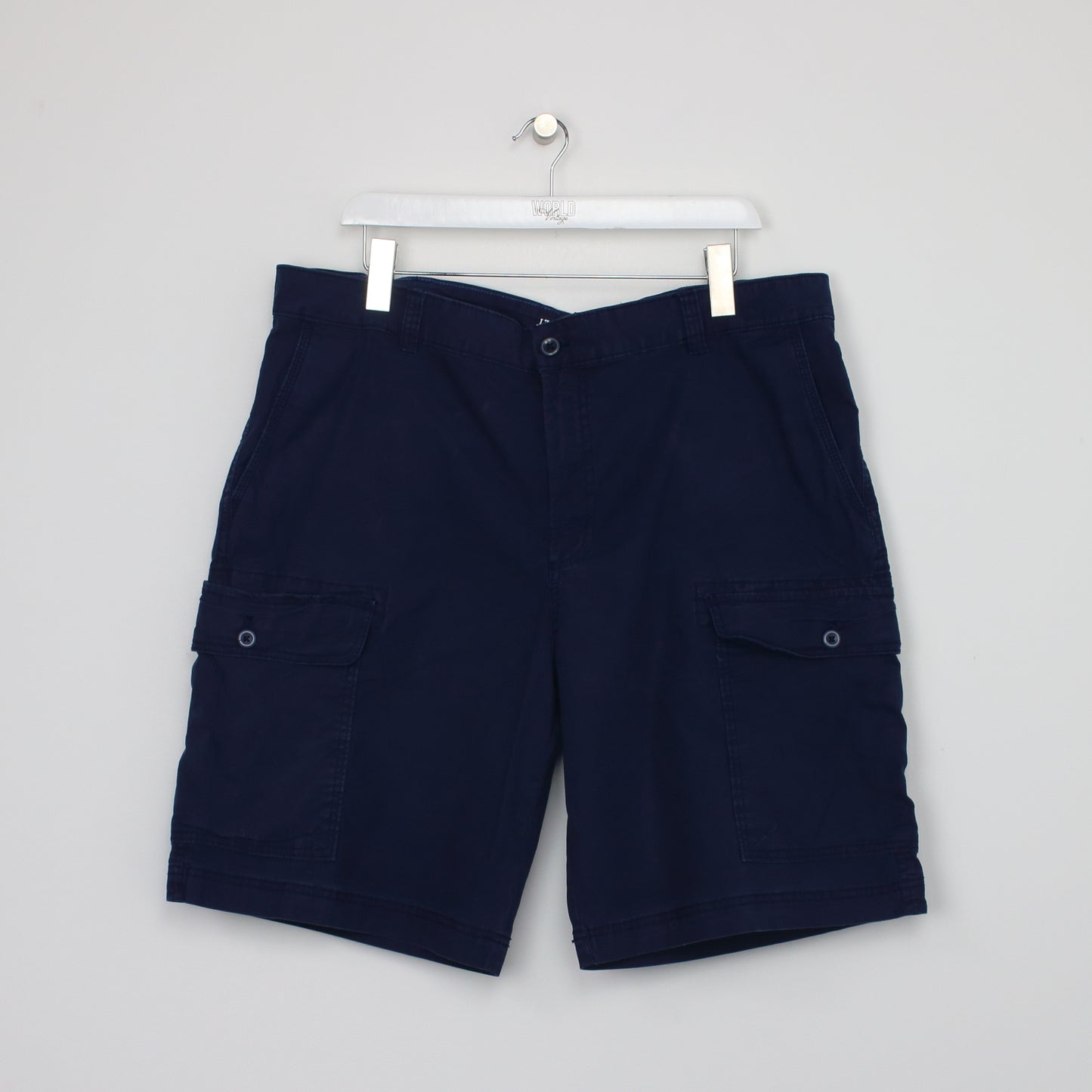 Vintage Izod Cargo shorts in navy. Best fits W40