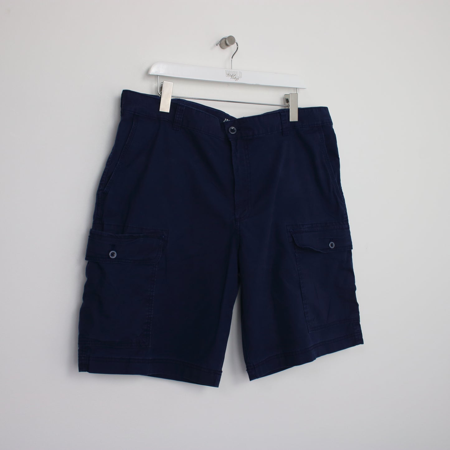 Vintage Izod Cargo shorts in navy. Best fits W40