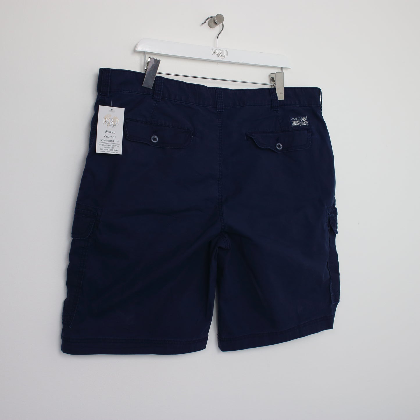 Vintage Izod Cargo shorts in navy. Best fits W40