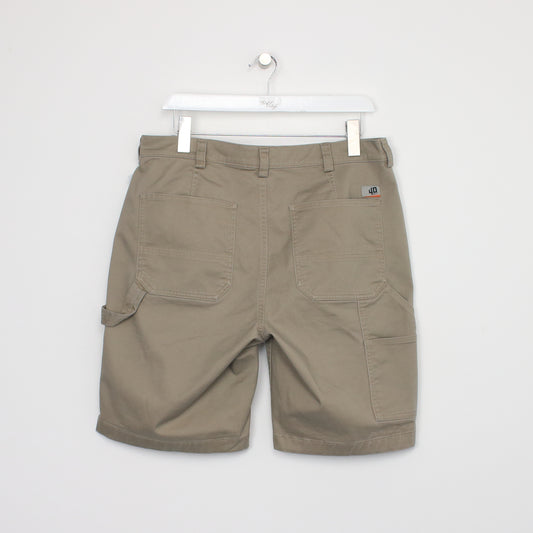 Vintage Duluth Trading Cargo shorts in tan. Best fits W34