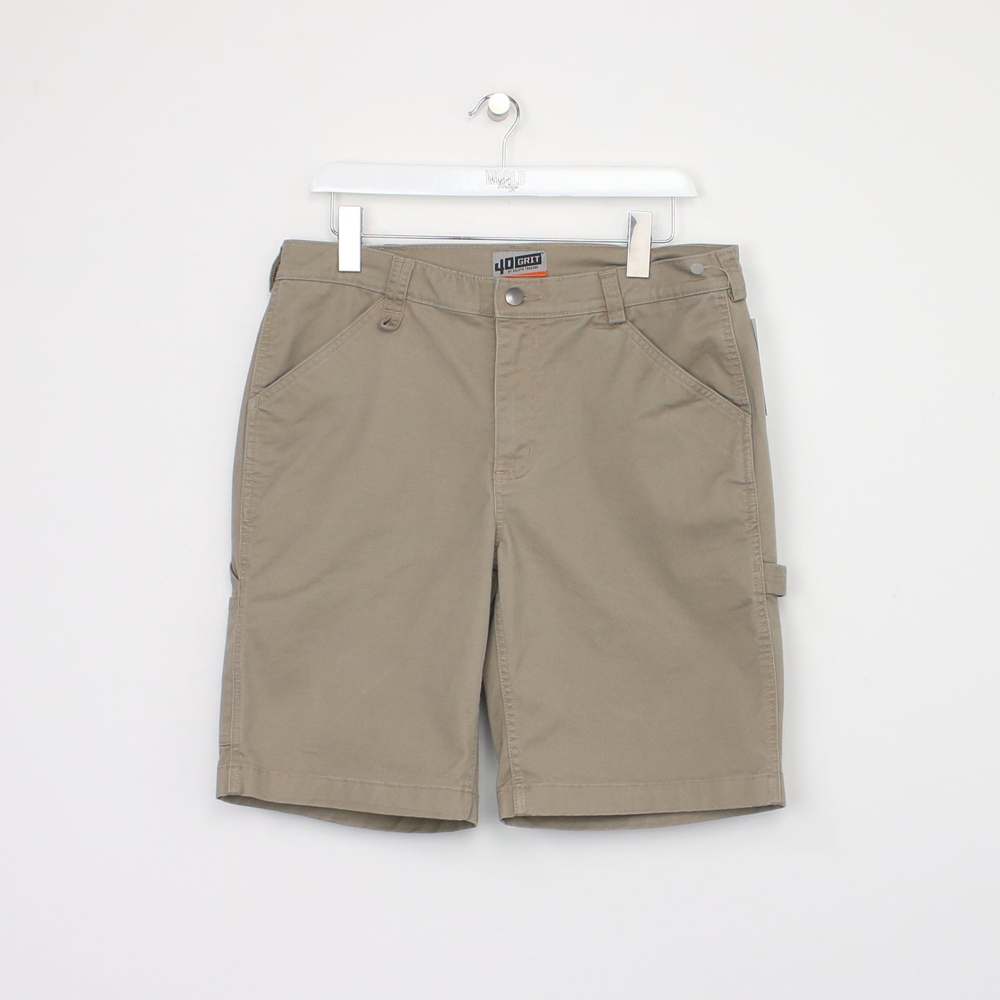 Vintage Duluth Trading Cargo shorts in tan. Best fits W34